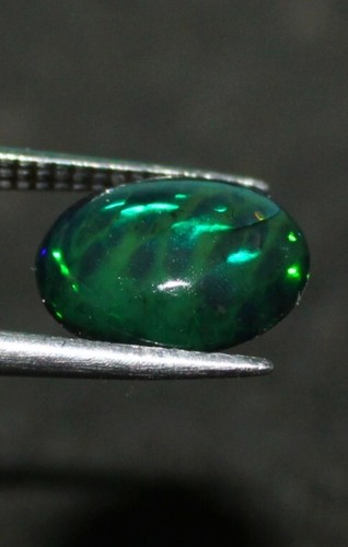 Black Opal gemstone 1.70 Cts AAA natural Black Ethiopian Opal oval opal cabochon - Picture 3 of 4