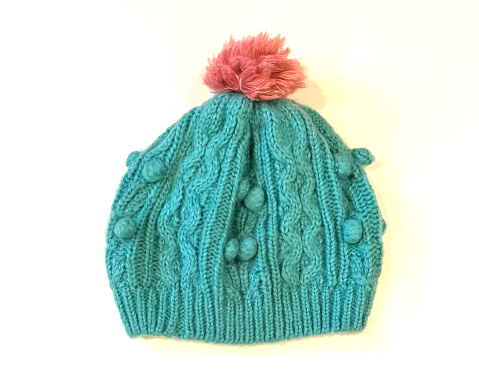 MINI GORRO TEJIDO CABLE AZUL SUELO CON POM NIÑA NIÑO XS 2-4 YO Foto 2 de 3