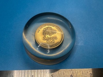 VINTAGE   $1 -SIERRA SID S SPARKS NEVADA   -GAMING TOKEN IN LUCITE