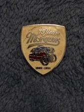 Morgan Motors 75 years badge