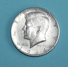 1964 D Kennedy Half, some fine scratches on obverse.