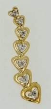 10k Yellow Gold Heart Fancy Pendant with .5 cttw diamonds.