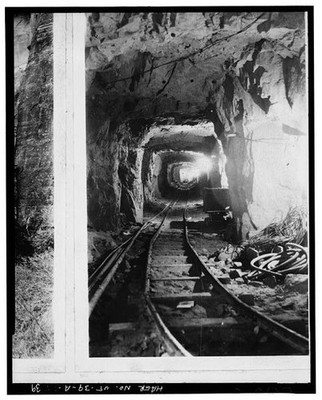 39. Historic photograph: Tunnel bore under construction. View shows light