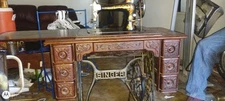 Antique Vintage Singer sewing machine in cabinet. Treadle Table Wrought Iron.