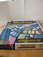 Triopoly Reveal Entertainment Boardgame 3D Game of Buying Building Cities