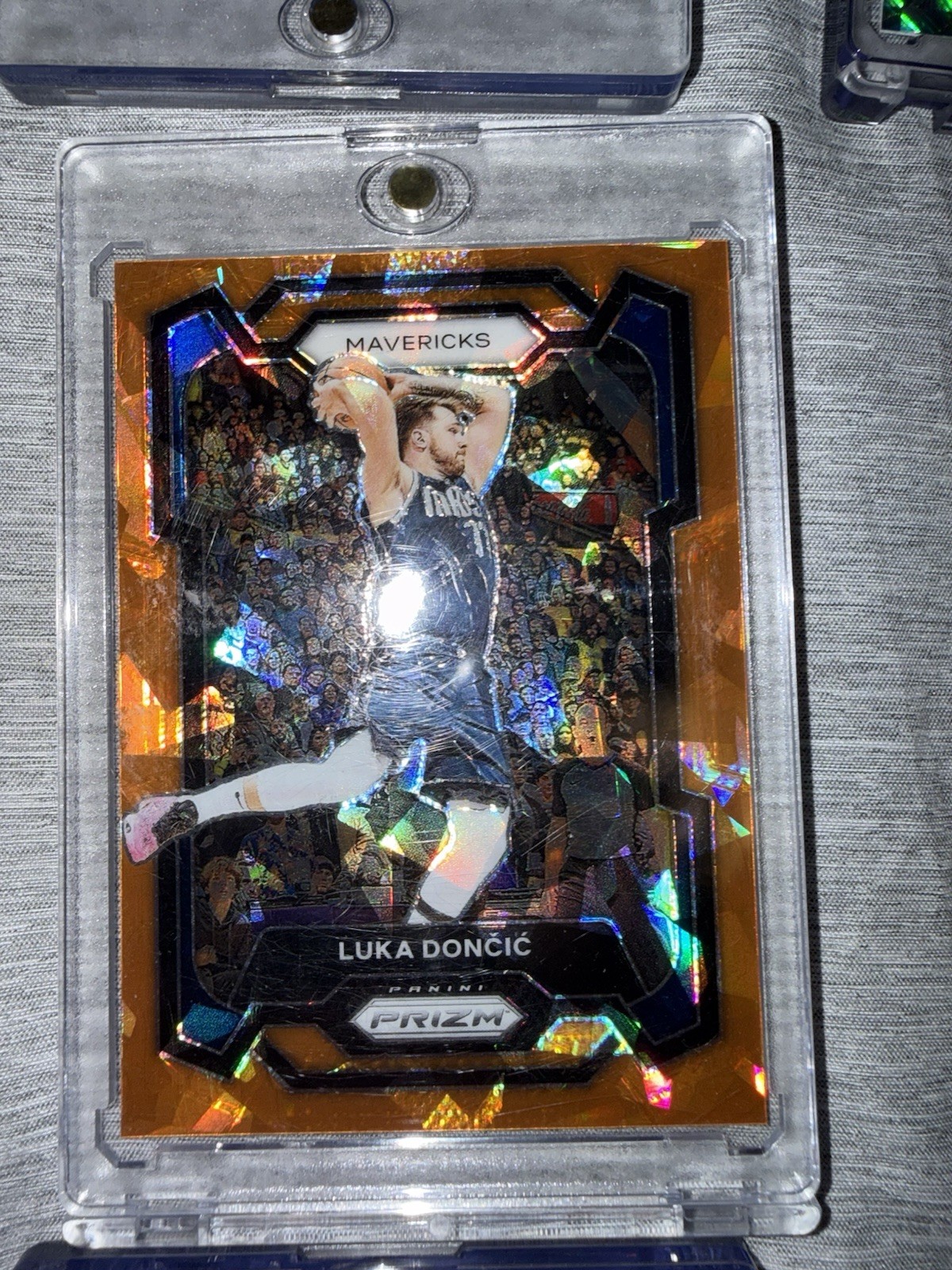 2023-24 Panini Prizm Luka Doncic #110 Orange Ice Prizm Mavericks