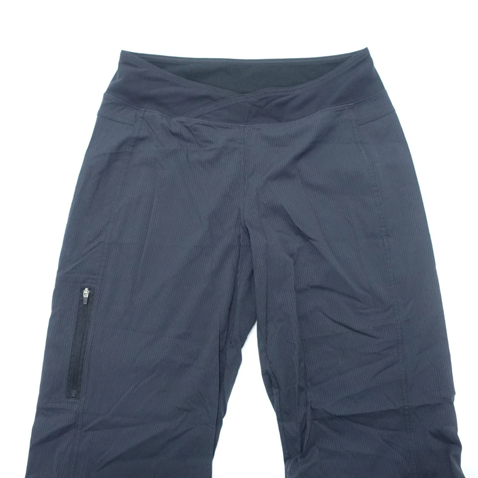 Pantalones para mujer Reebok 8 azules a rayas elásticos bolsillos con cremallera pierna ancha Foto 3 de 4