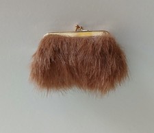 Integrity Reservation for Two Isha Faux Fur Clutch Purse