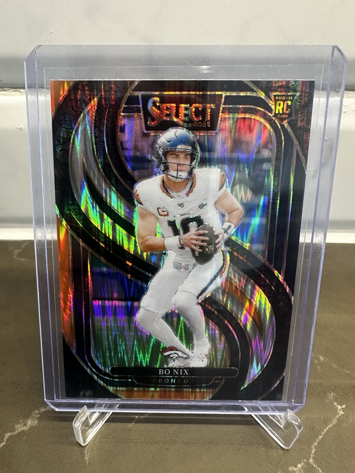 2024 Panini Select - Premier Level Bo Nix #117 Black & Orange Shock Prizm (RC)