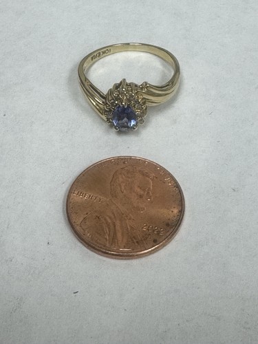 10k Gold Ring With Pear Shaped Tanzanite And Diamonds Around It - Picture 8 of 13