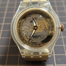 Swatch Gold Tone Open Work Dial Analog Watch Expansion Bracelet
