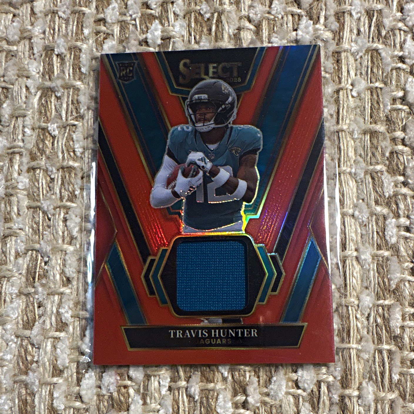 Panini 2025 Select Football Travis Hunter Rookie Swatches Red Prizm #RSW-THR