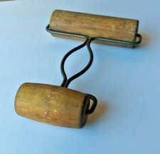 WOOD TWO SIDED INK ROLLER. WIRE METAL HANDLE