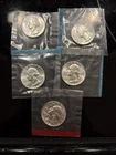 1964 Washington Silver Quarter. Uncirculated Still In The Plastic. Lot Of Five.￼