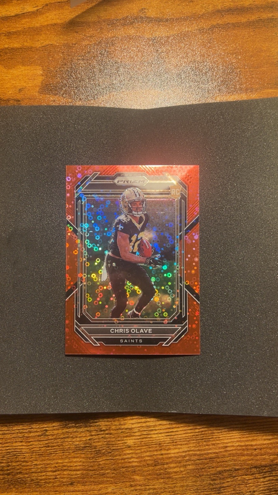 2022 Panini Prizm - Rookies Chris Olave #310 No Huddle red Prizm /50 (RC)