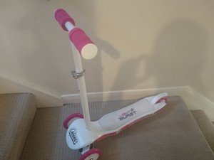 light burst pink and white scooter