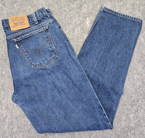 Vintage 90s Levi's 601 White Tab Relaxed Fit Tapered Medium Wash Jeans 36x34