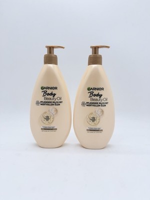 2x Garnier Body Oil Beauty Nährende Öl-Milch Argan Macadamia Mandel Rose 400ml