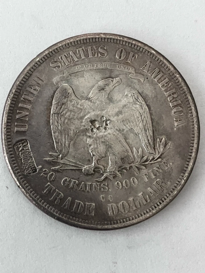 Dólar comercial 1875 CC, picado marcado en la parte posterior, limpio.  ¡Fantástica moneda histórica! Foto 2 de 3
