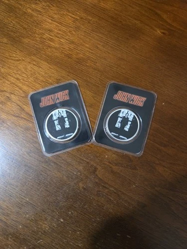 (2) John Wick Silver Coins