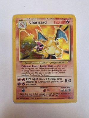 Charizard #4 from Base Set ((1999)) – Pokémon card