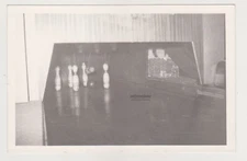 The Precise Moment of Impact in a Vintage Bowling Game Snapshot Abstract Photo