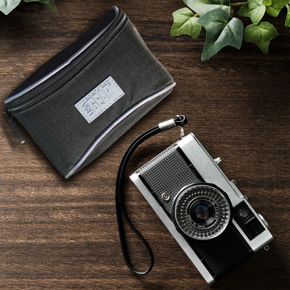 Estuche compacto para cámara digital con interior acolchado, lazo para cinturón y bolsillo adicional Foto 2 de 4