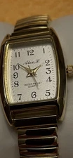 Alex L. Watch Rectangular Face Gold Toned Expansion Band. Runs.