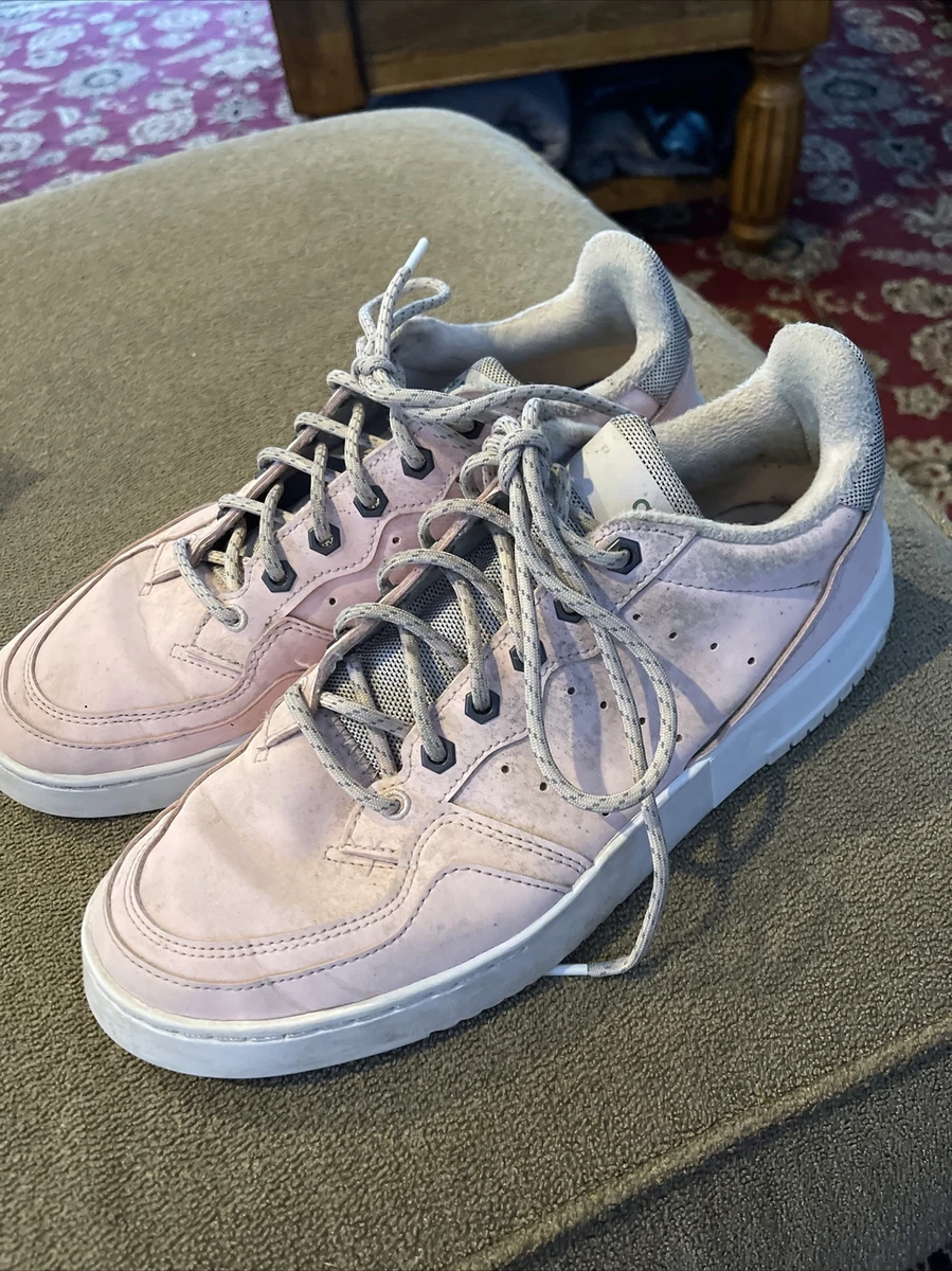 Light pink and top white adidas shoes