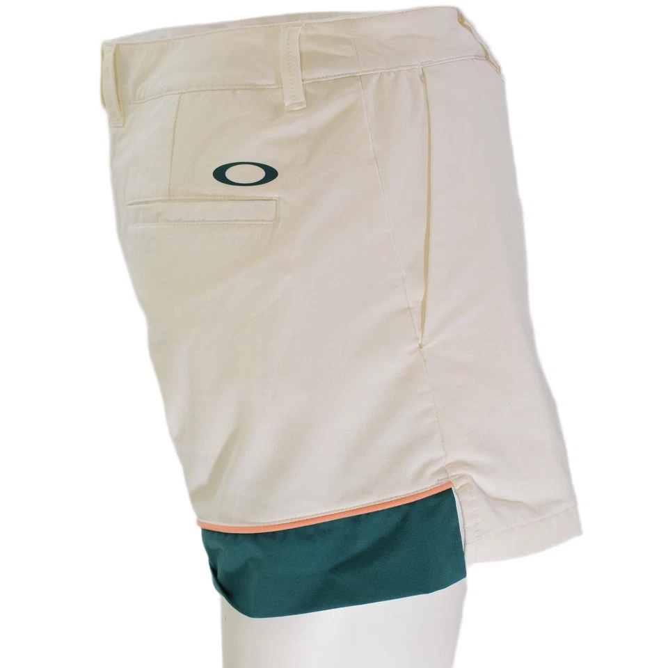 Pantalones cortos de golf Oakley blancos de nailon para mujer M bloques de colores borde melocotón forrados ajuste atlético Foto 3 de 4