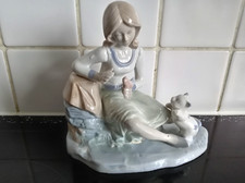 Lladro - like porcelain figurine - it looks like cat nap or Rosalinda.