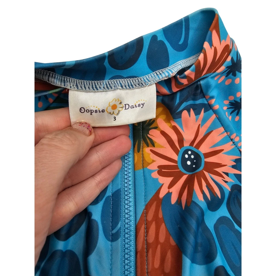 Traje de baño Oopsie Daisy Boutique niñas talla 3T de una pieza floral con volantes azul Foto 3 de 4