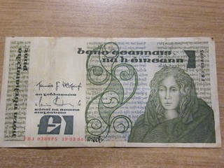 A 1986 Ireland One Pound Banknote Used folds but still crisp has few marks