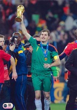 IKER CASILLAS SIGNED SPAIN 2010 WORLD CUP WINNERS 12X8 PHOTO (ACG CERT AG17169)