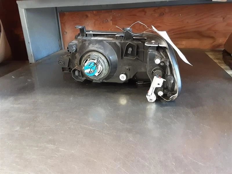 Bisel de faros de pasajero color para 00-04 MONTERO SPORT 244132 Foto 4 de 4