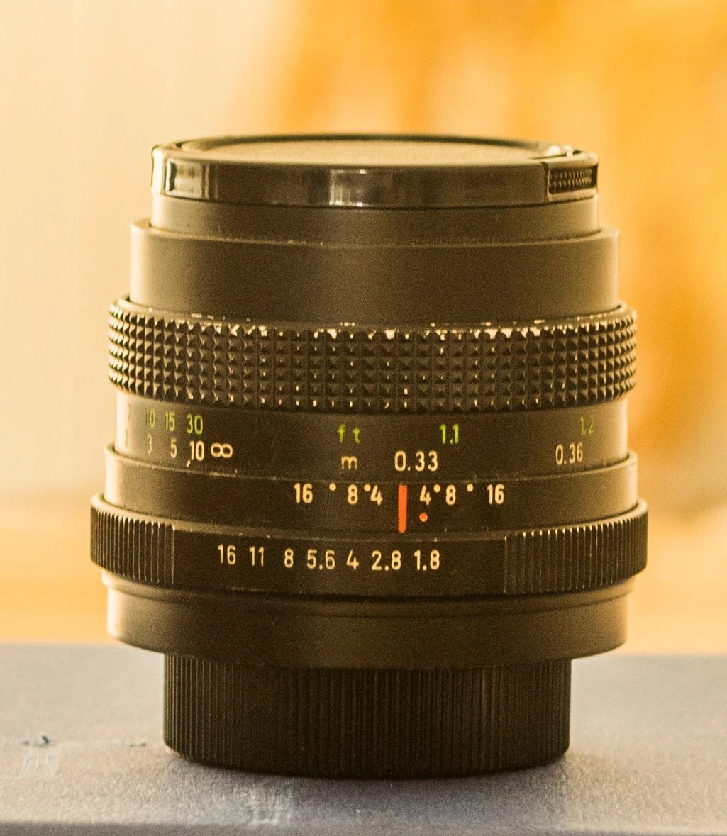 Objectif M42 50mm f1,8 MEYER OPTIK ORESTON, bouchons, pare-soleil et