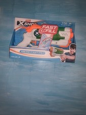 a Zuru X-Shot Water Warfare Micro Fast-Fill Water Blaster.