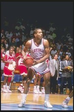 Guard Bo Kimble Loyola Marymount Lions holds the ball at a game Old Photo