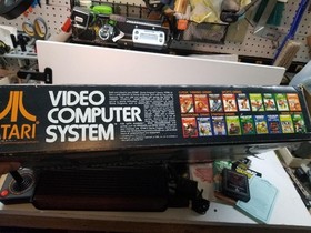 Atari 2600 Woody Console-Complete in Numbers matching box-low serial #-4 switch