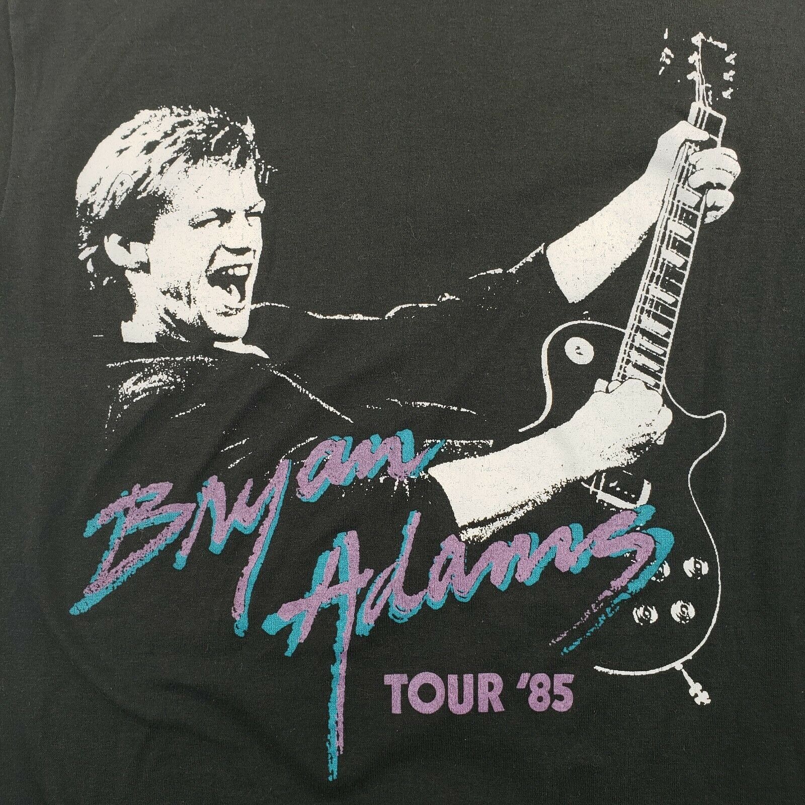 who did bryan adams tour with in 1985