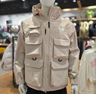 THE NORTH FACE MEN'S STORAGE WATERPROOF JACKET LIGHT_BEIGE NJ2HQ56B LOOSE FIT