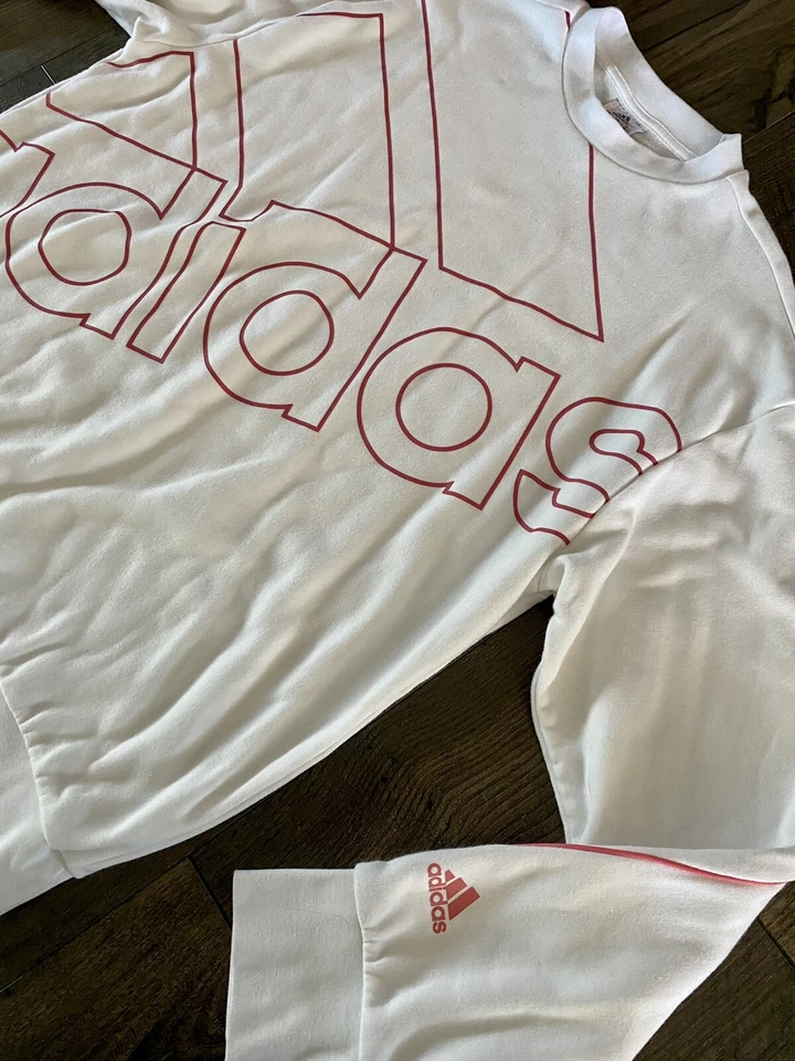 Sudadera pulóver Adidas Essentials para mujer de gran tamaño con logotipo blanca y rosa mediana Foto 2 de 3
