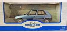 Model Car Group MCG 1:18th Peugeot 205 GR 4 door metallic blue