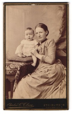 Photograph C. Clare, Freiburg i. B., mother in Biedermeier dress with toddler a 