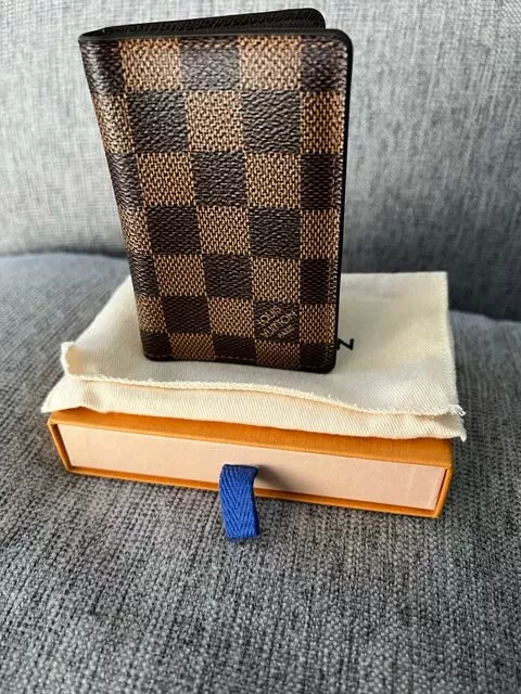 Louis-Vuitton pocket organizer brown checkered pattern. Seasonal item.