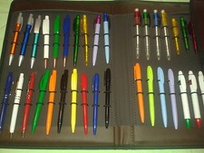 Set with different pens in leather case
