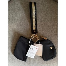 Black Lululemon wristlet with gold accents LululemonAccessories