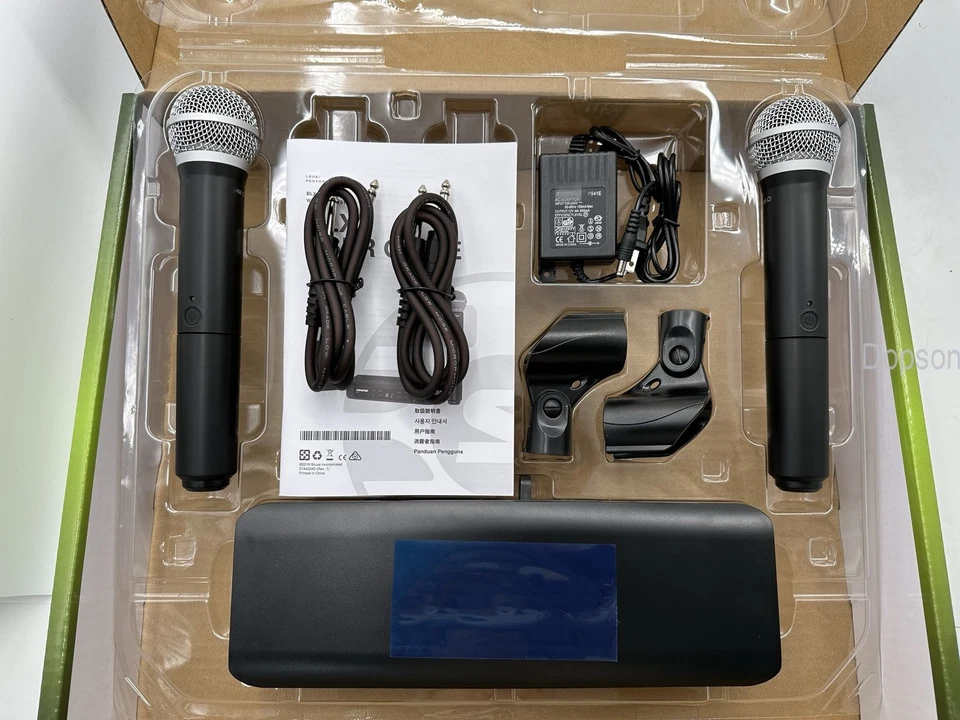 Sistema de micrófono inalámbrico de mano viene con 2 micrófonos BLX288/PG58 en stock Foto 3 de 4