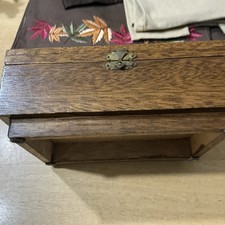 wooden box with hinged lid