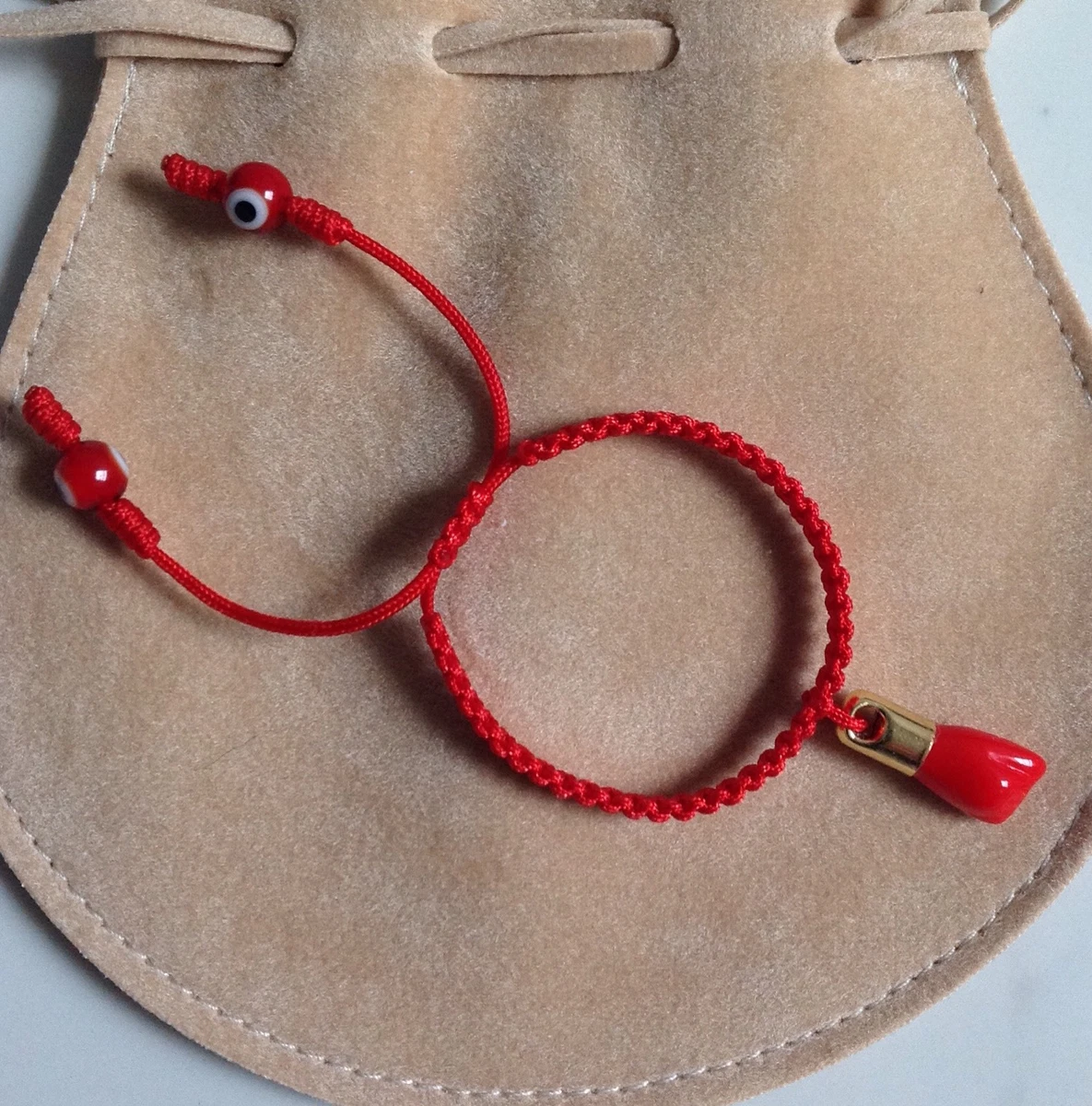 Red string shop bracelet for baby